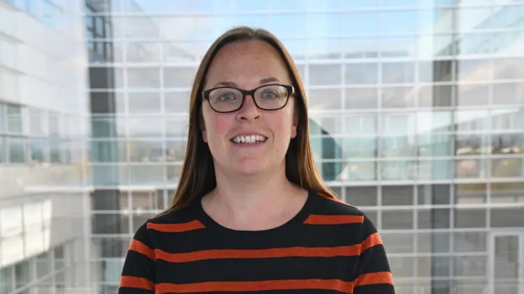 Photo of a person smiling.